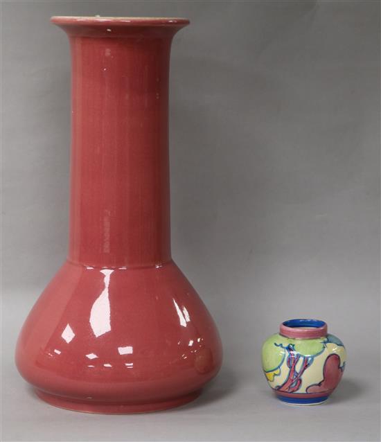 A Clarice Cliff Bizarre miniature vase and an Ault vase